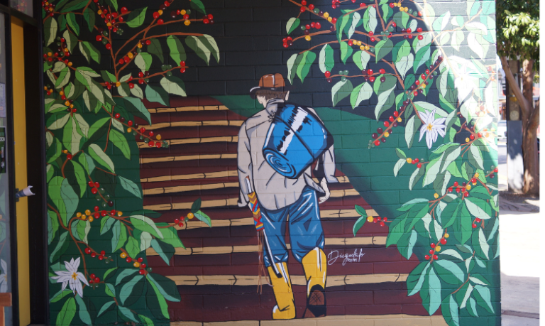 Tropical jungle mural painted along a staircase wall