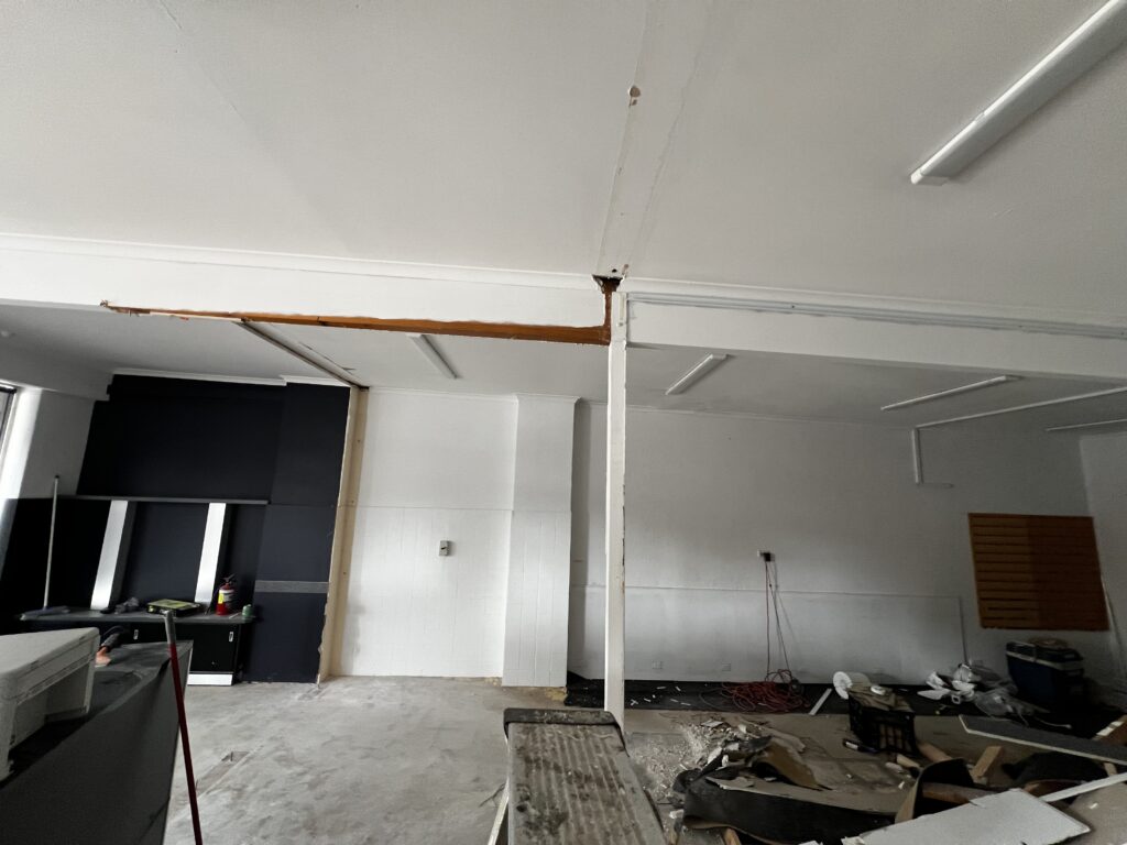 KOM Coffee Roasters shop interior during demolition before the fit-out