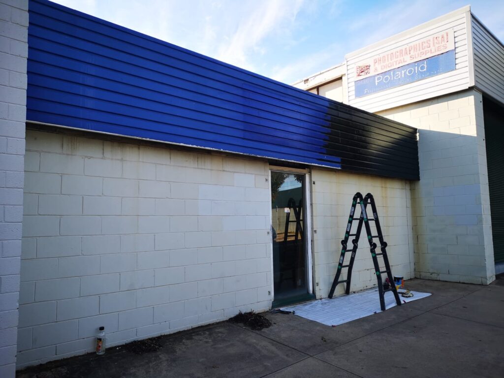 The old photography studio in Kent Town before the Cafetal Coffeeco transformation, with the blue facade being painted black