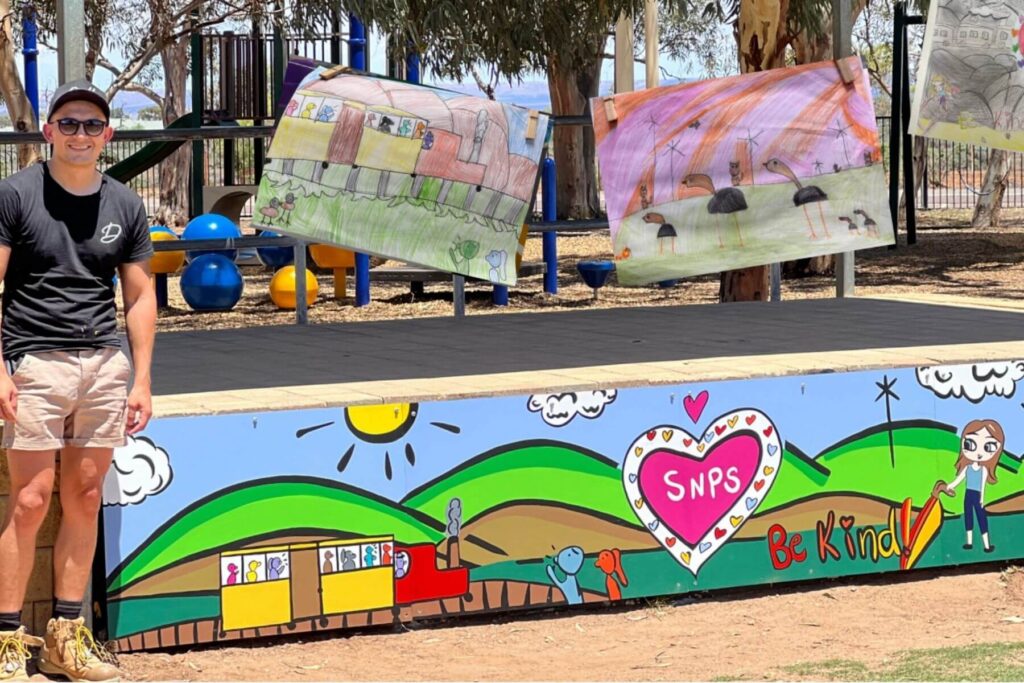 1 Diegodalo with a finished playground mural at an Adelaide primary school