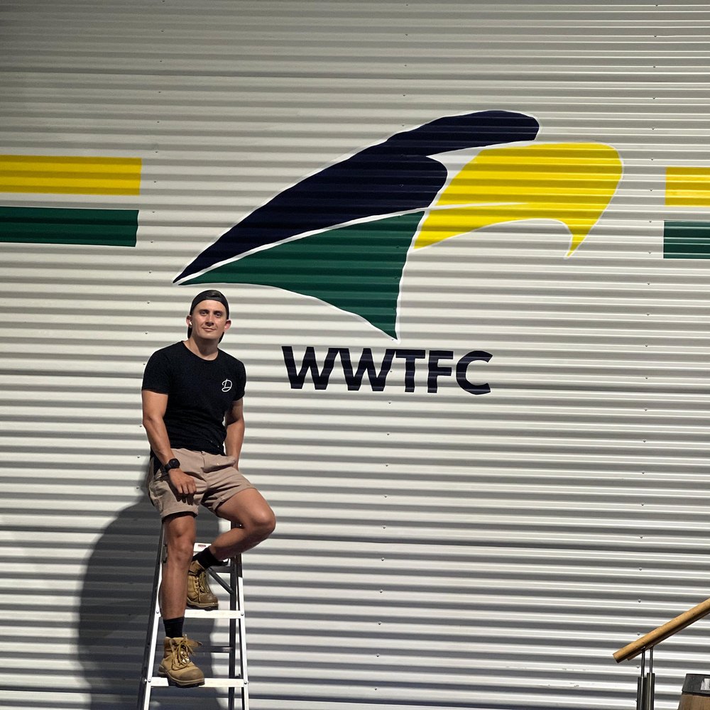 Diegodalo with the finished hand-painted WWTFC logo at Craig Arthur Transport
