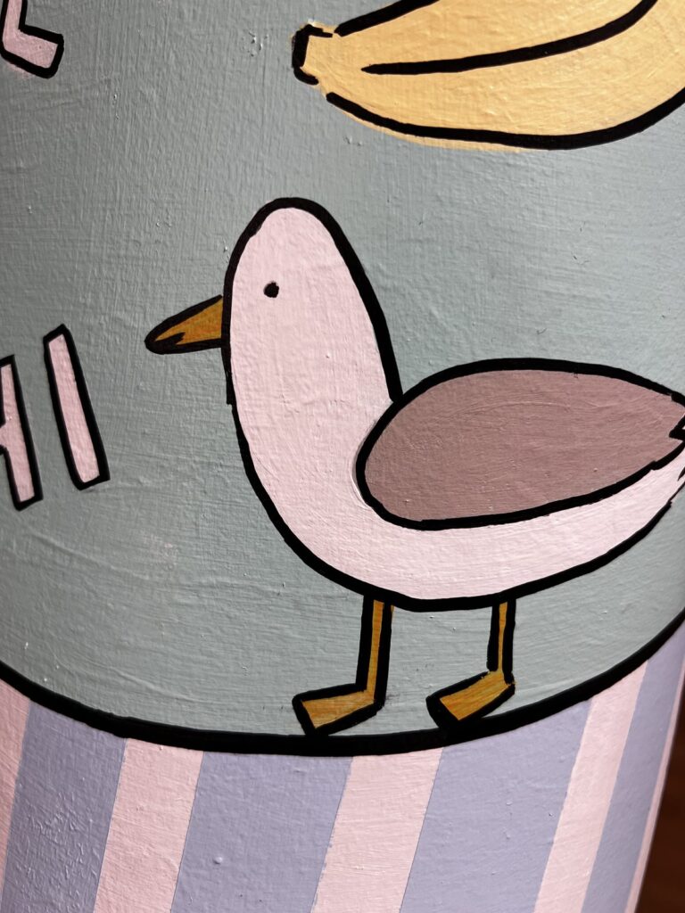 Hand-painted seagull detail on the Semaphore Beach Yo-Chi Bear