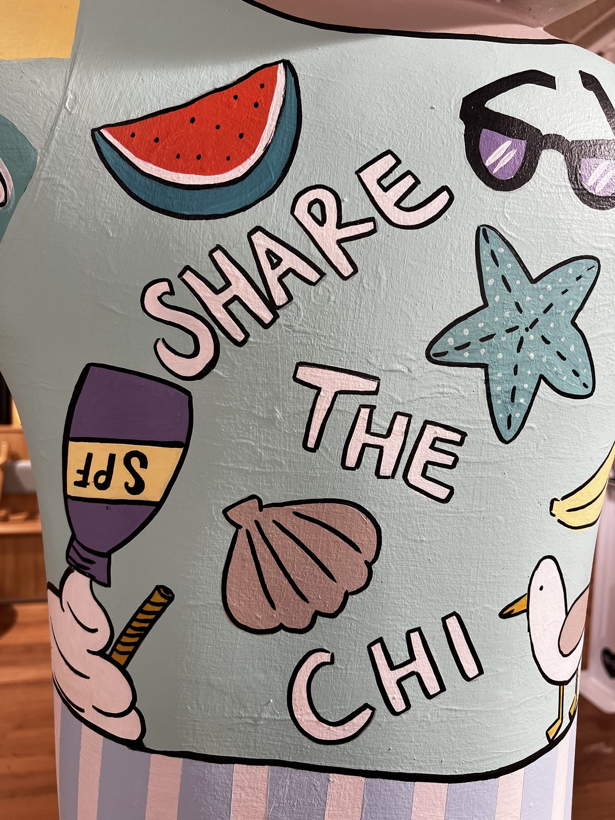 Share the Chi lettering with watermelon, sunscreen and shell details on the Semaphore Beach Yo-Chi Bear